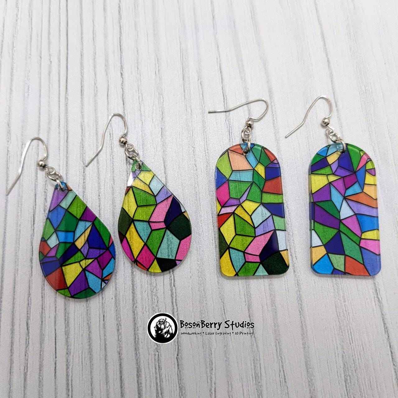 Teardrop and arched tile shaped Pastel Stained Glass Acrylic Earrings on white background