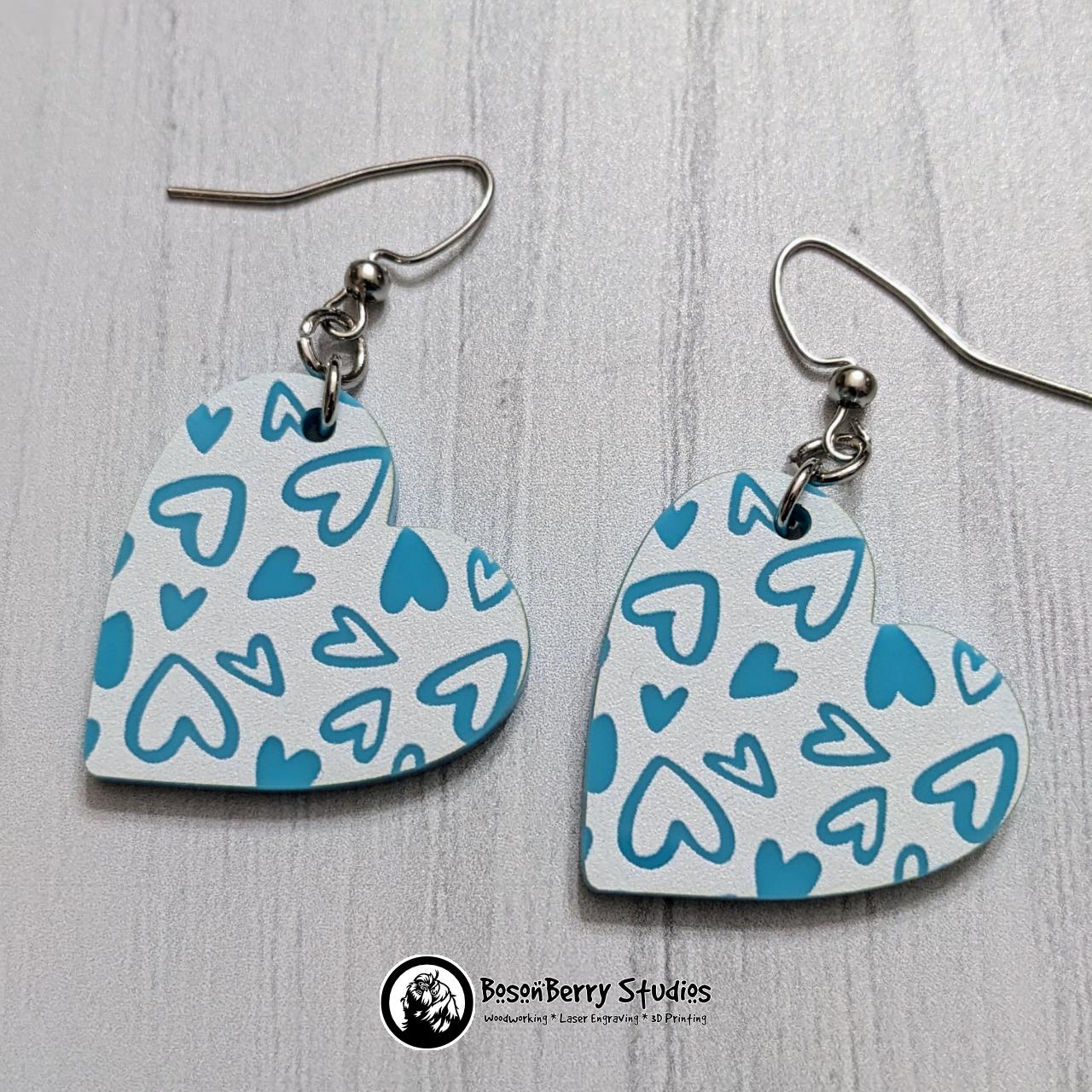 Colored Heart Acrylic Earrings in Red or Teal