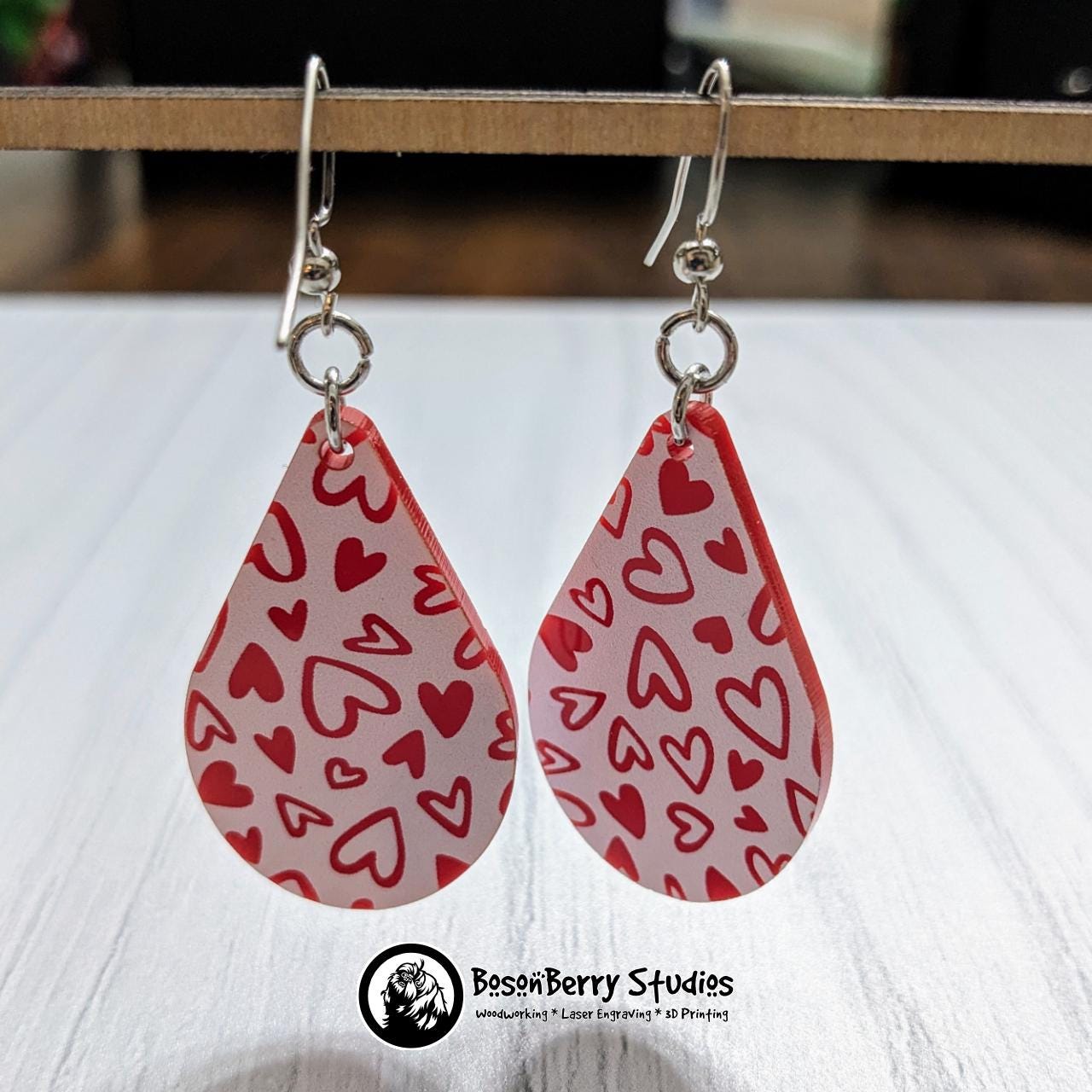 Colored Heart Acrylic Earrings in Red or Teal