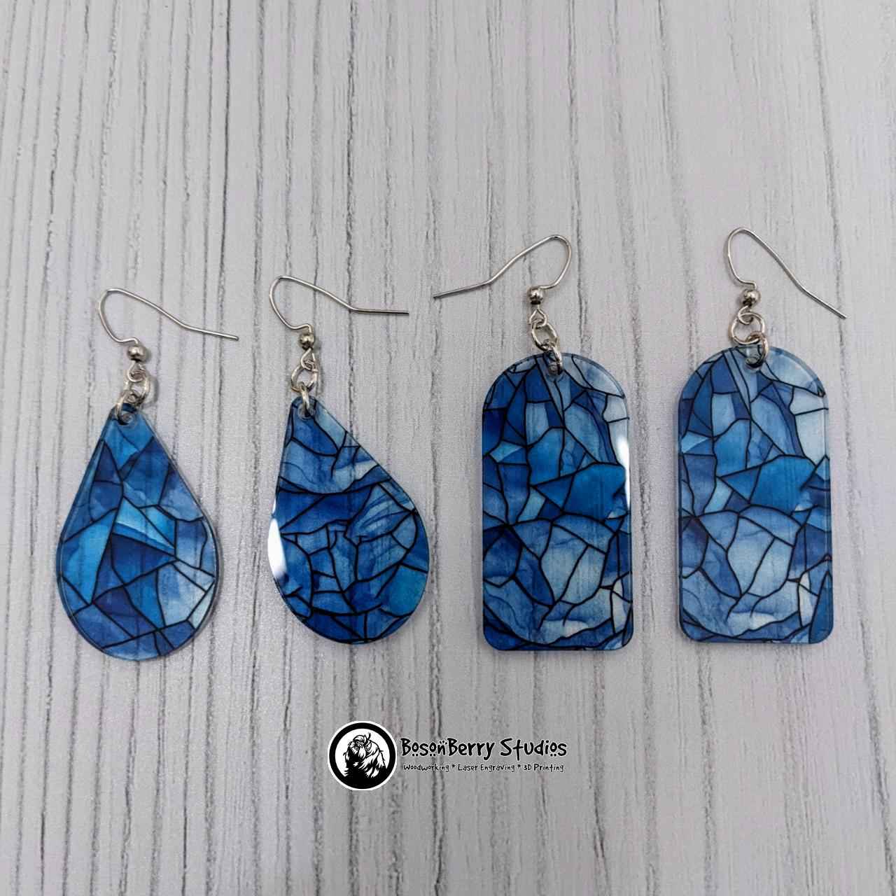 Teardrop and arched tile shaped Icy Stained Glass Acrylic Earrings on white background