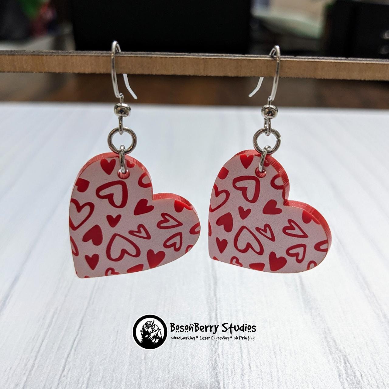 Colored Heart Acrylic Earrings in Red or Teal