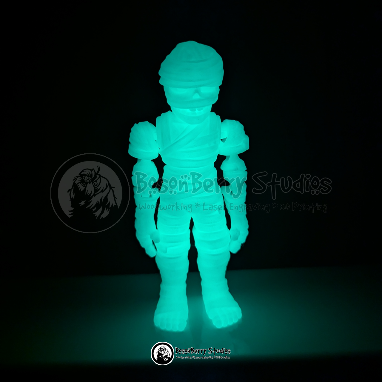 Glowing green mummy articulated figure against a black background with 'BosonBerry Studios' branding.