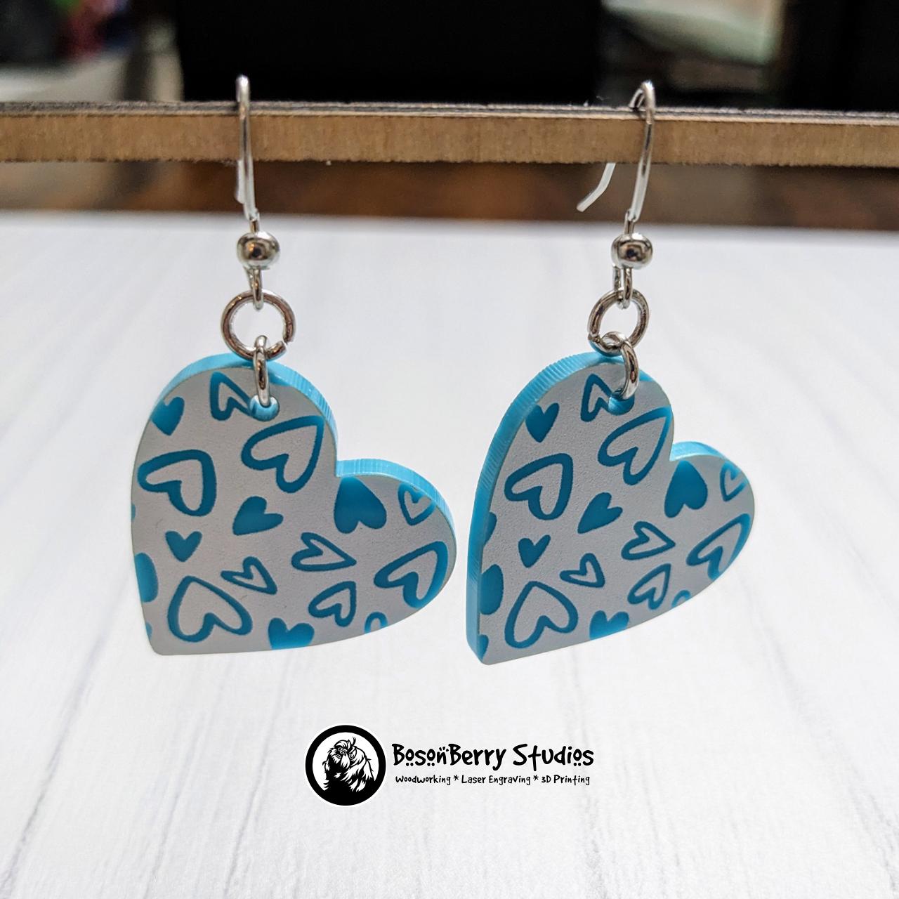 Colored Heart Acrylic Earrings in Red or Teal