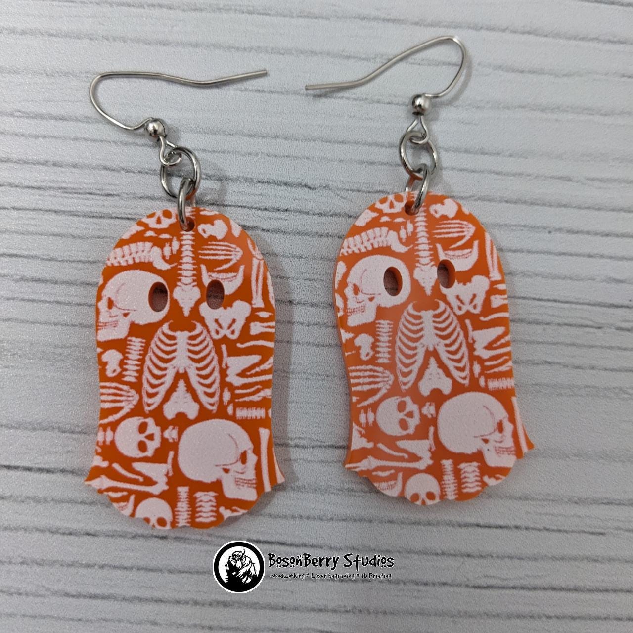 Acrylic "Scattered Bones on Orange" Earrings | Halloween Spooky Fun Fall | Skull Bone Cat Bat Pumpkin Shapes | Laser Cut