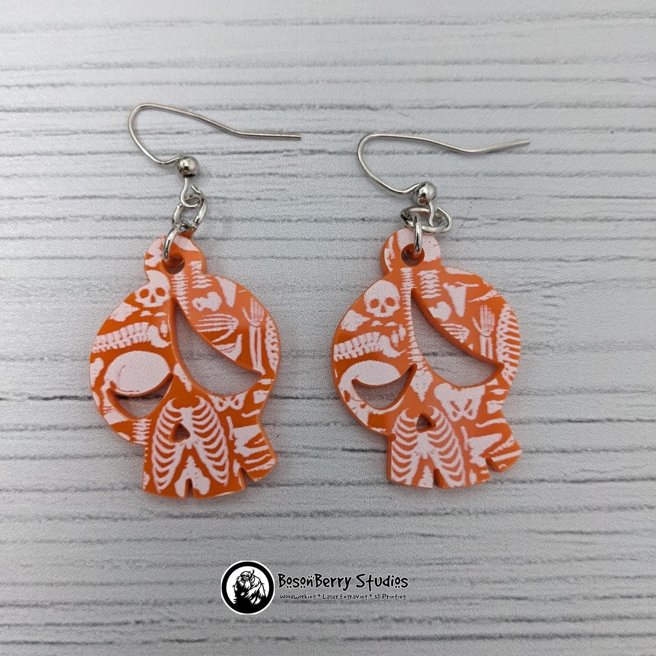 Acrylic "Scattered Bones on Orange" Earrings | Halloween Spooky Fun Fall | Skull Bone Cat Bat Pumpkin Shapes | Laser Cut