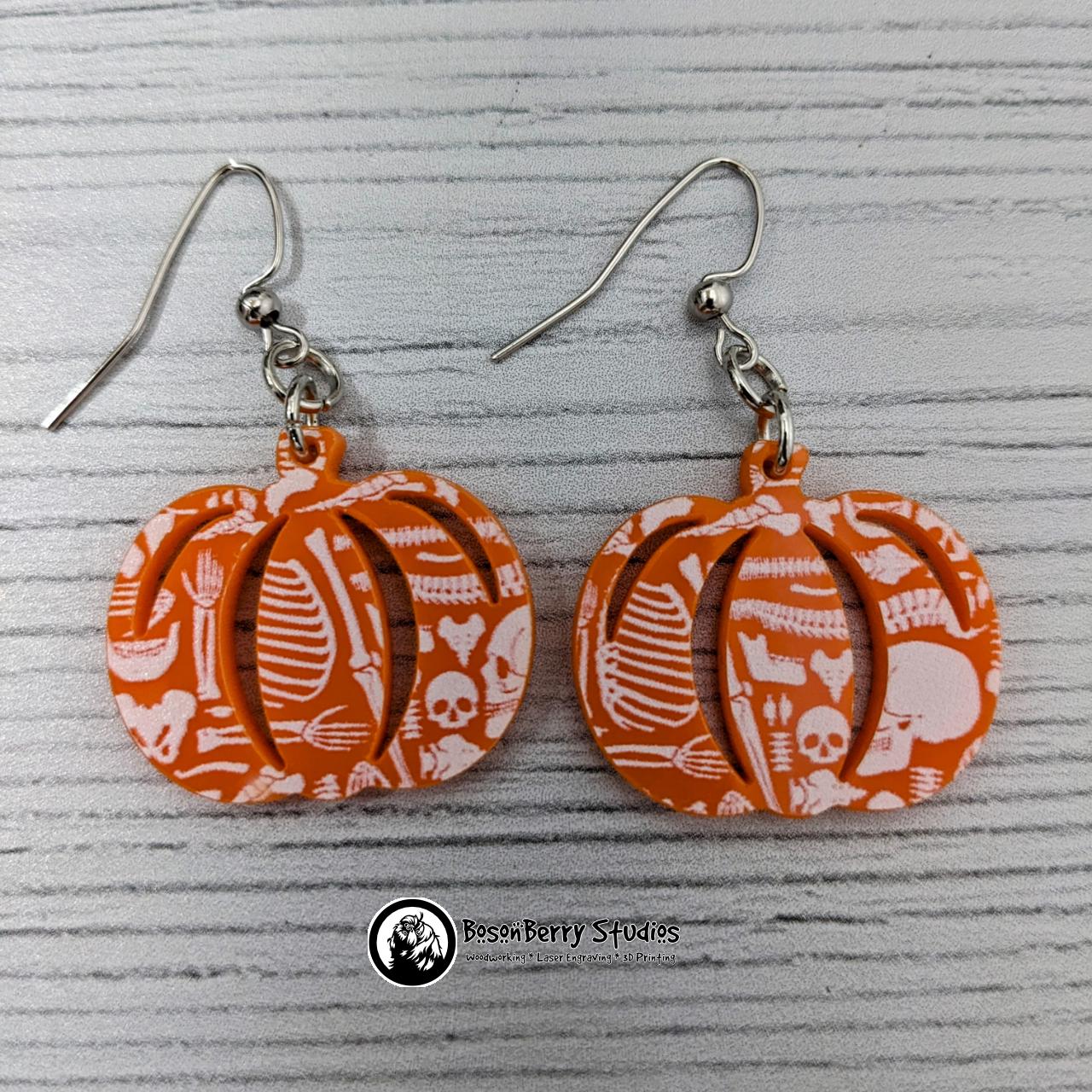 Acrylic "Scattered Bones on Orange" Earrings | Halloween Spooky Fun Fall | Skull Bone Cat Bat Pumpkin Shapes | Laser Cut