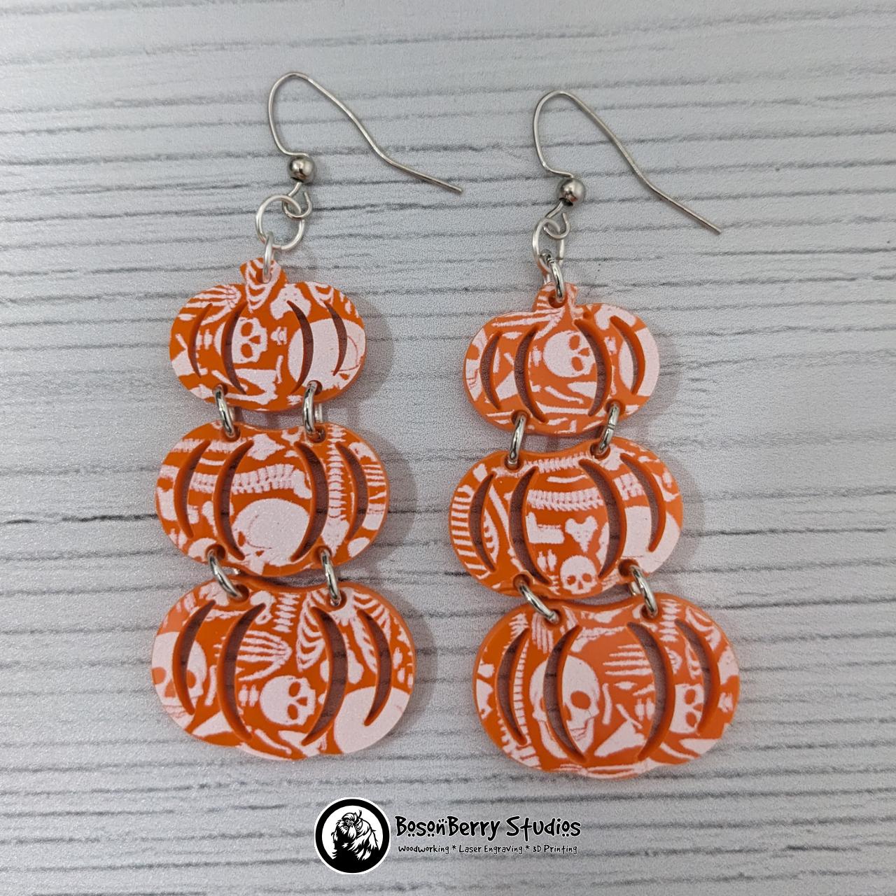 Acrylic "Scattered Bones on Orange" Earrings | Halloween Spooky Fun Fall | Skull Bone Cat Bat Pumpkin Shapes | Laser Cut